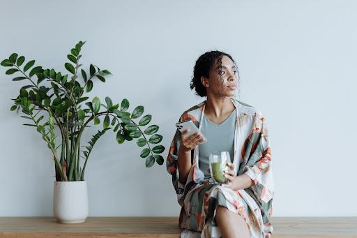 woman just sitting there with a cup of coffee, get a job!!